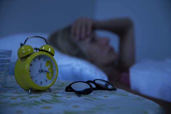 insomniac woman 
Woman struggling to wake up in the morning.