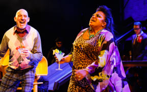 Man and woman on stage