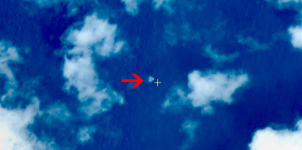 A satellite image taken from space illustrating an object in a "suspected crash sea area" in the South China Sea on 9 March.