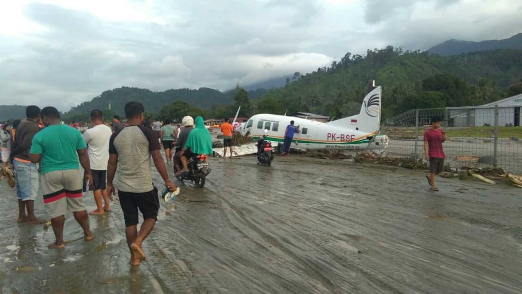 The day after: an airport affected by flash flooding in Papua's Jayapura regency, 16 March 2019.