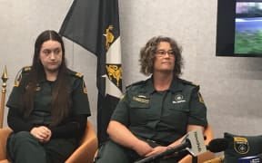 Call-taker Spencer Dennehy (left) and ambulance dispatcher Dawn Lucas were both working on Friday during the time of the attacks.