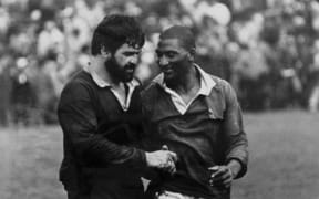 Bill Bush shakes hands with Errol Tobias after the Maori All Blacks and Springboks’ famous 12-all draw at McLean Park, Napier, 1981. Tobias was the first coloured South African player to tour New Zealand with the Springboks.