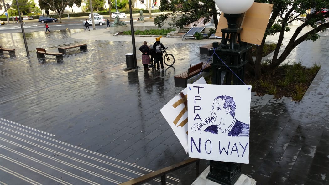 A protest sign left at the site of the Wellington anti-TPP rally.