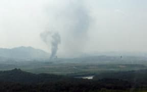 Smoke rises from North Korea's Kaesong Industrial Complex where an inter-korean liaison office was set up in 2018, as seen from South Korea's border city of Paju on June 16, 2020.