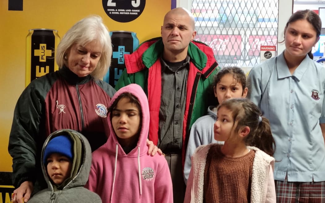 Inglewood Primary principal Karen Patterson with the Fruen family at the opening of the crossing