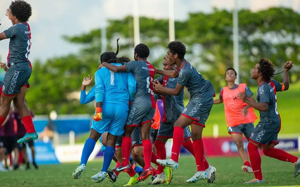 New Caledonia celebrate after their shootout victory