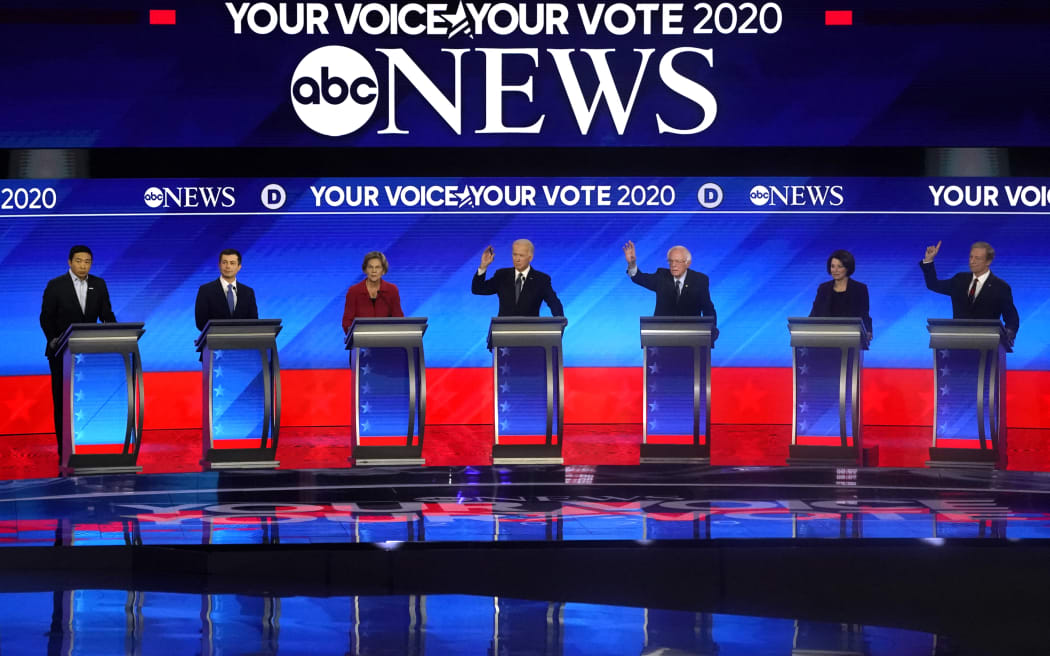 (From L) Democratic presidential hopefuls entrepreneur Andrew Yang, former Mayor of South Bend, Indiana, Pete Buttigieg, Massachusetts Senator Elizabeth Warren, former Vice President Joe Biden, Vermont Senator Bernie Sanders, Minnesota Senator Amy Klobuchar and Billionaire activist Tom Steyer take part in the eighth Democratic primary debate of the 2020 presidential campaign season co-hosted by ABC News, WMUR-TV and Apple News at St. Anselm College in Manchester, New Hampshire, on February 7, 2020.