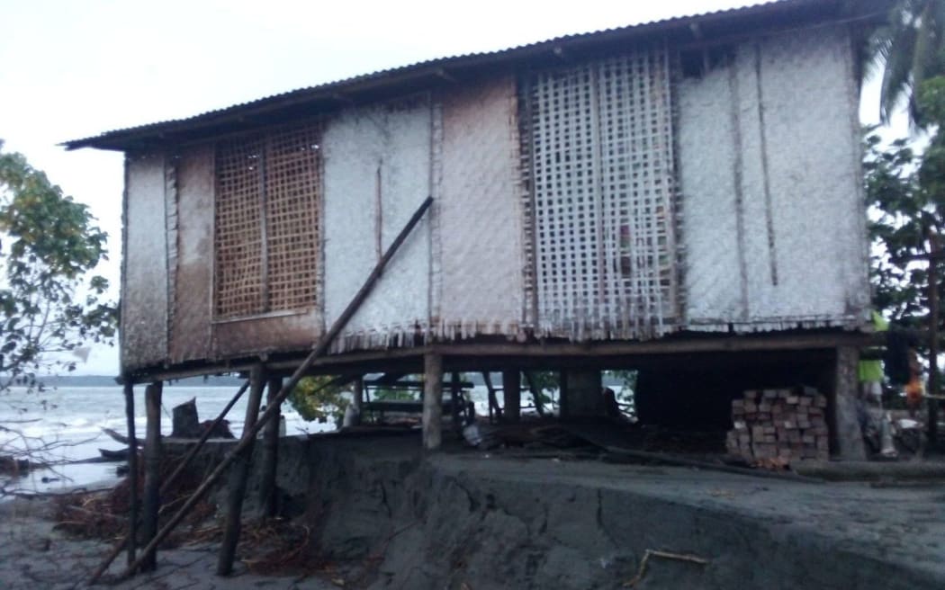 A house undermined by king tides in Siviri.