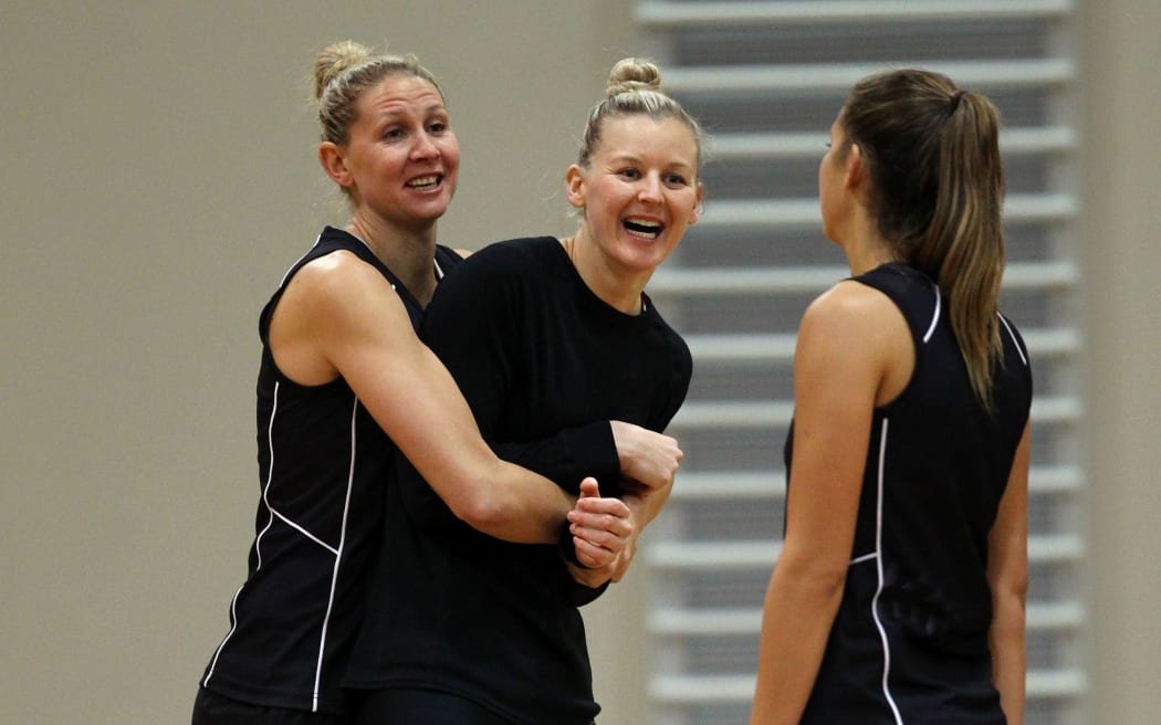 Silver Ferns captain Casey Kopua (L) hugs fellow New Zealand defender Katrina Grant