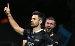 Kane Russel of New Zealand celebrates a goal.