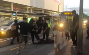 Screenshots taken from a Facebook video. Some faces have been blurred.