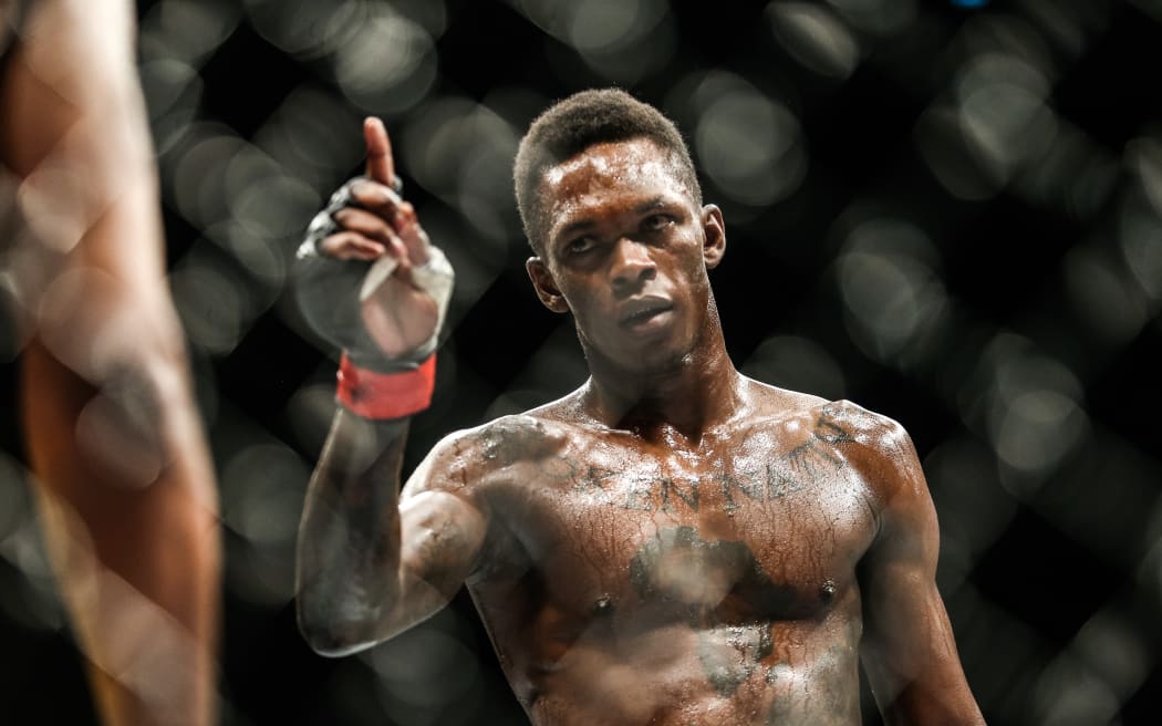 Israel Adesanya in black shorts in action during UFC 234 at Rod Laver Arena Melbourne.