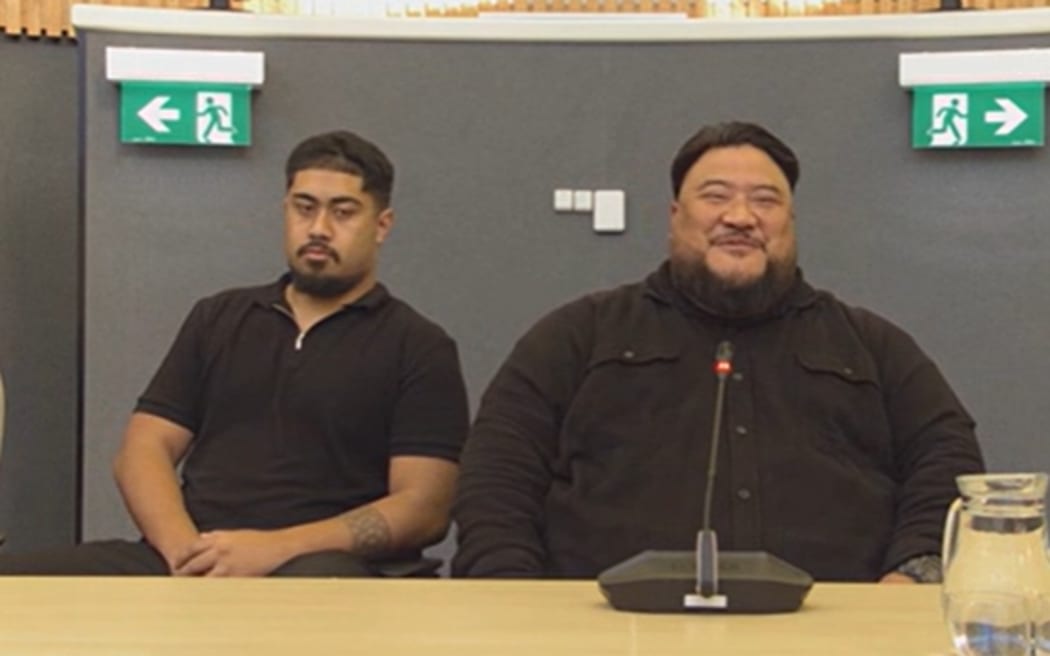 Saili Ah-Mann, pictured sitting beside Karl Tusini-Rex at a meeting.