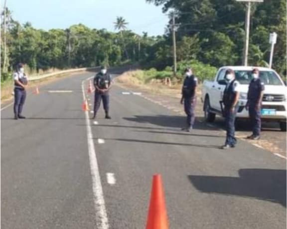 Police at a checkpoint near Nabouwalu,