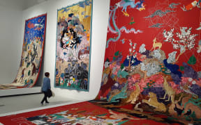 Installation view showing three large textiles at There Is No Other Home But This, an exhibition at Govett-Brewster Art Gallery.