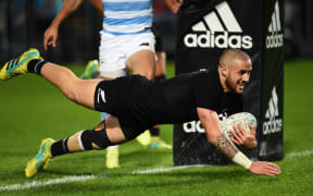 All Black TJ Perenara scores a try during their Rugby Championship test match against Argentina