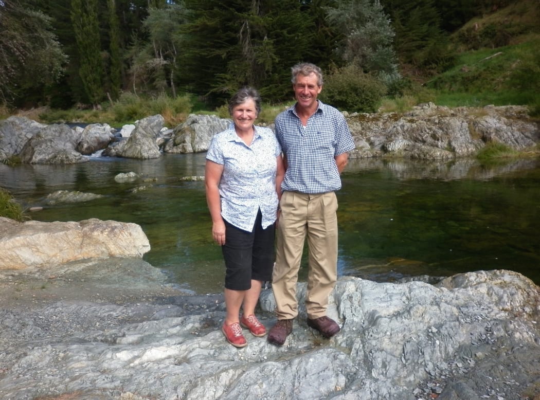 Jane and Peter Evans beside the Pareora River
