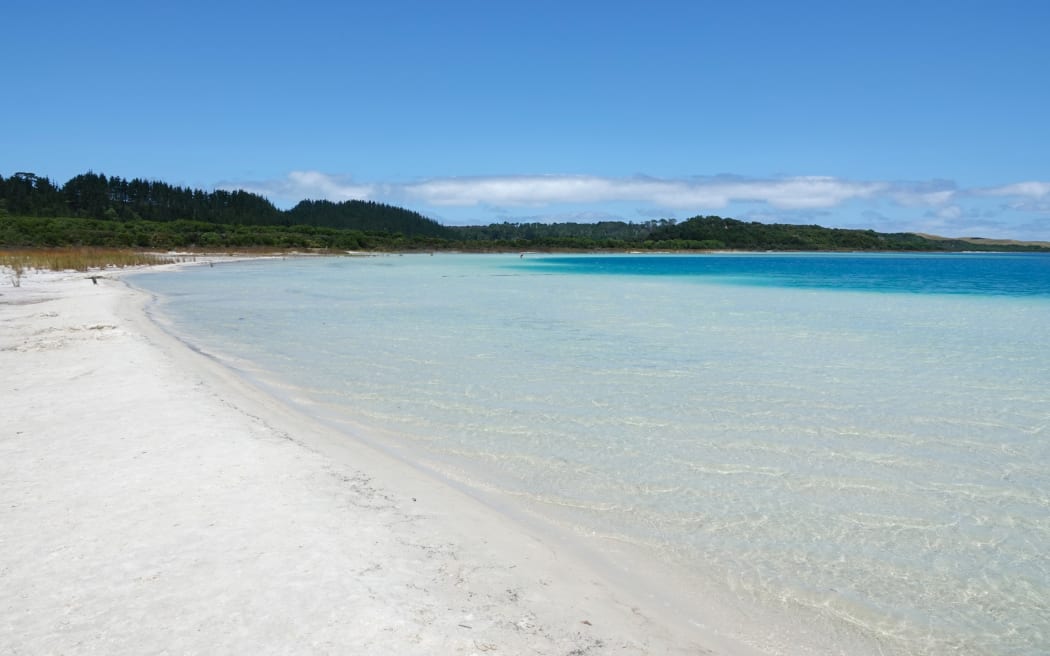 Lake Taharoa is renowned for its clear water and soft white sand.