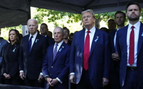 (L to R) US Vice President and Democratic presidential candidate Kamala Harris, US President Joe Biden, former Mayor of New York Michael Bloomberg, former US President and Republican presidential candidate Donald Trump and US Senator from Ohio and Republican vice presidential candidate J.D. Vance attend a remembrance ceremony on the 23rd anniversary of the September 11 terror attack on the World Trade Center at Ground Zero, in New York City on September 11, 2024. (Photo by Adam GRAY / AFP)