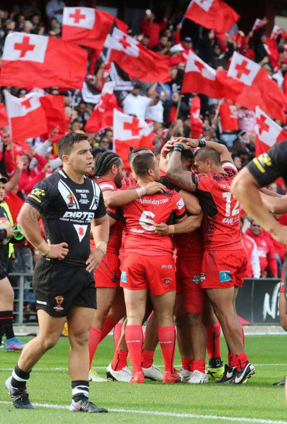 The Tongans celebrate a try.