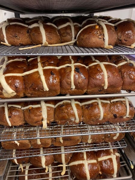 Nada Bakery's hot cross buns in rows.