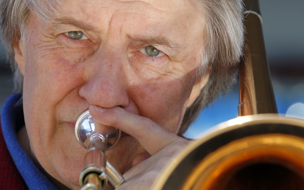 1312 2012 Photo Ross Giblin, copyright Dominion Post, Fairfax.
Jazz musician Rodger Fox with his trombone in his trusty old Toyota van.