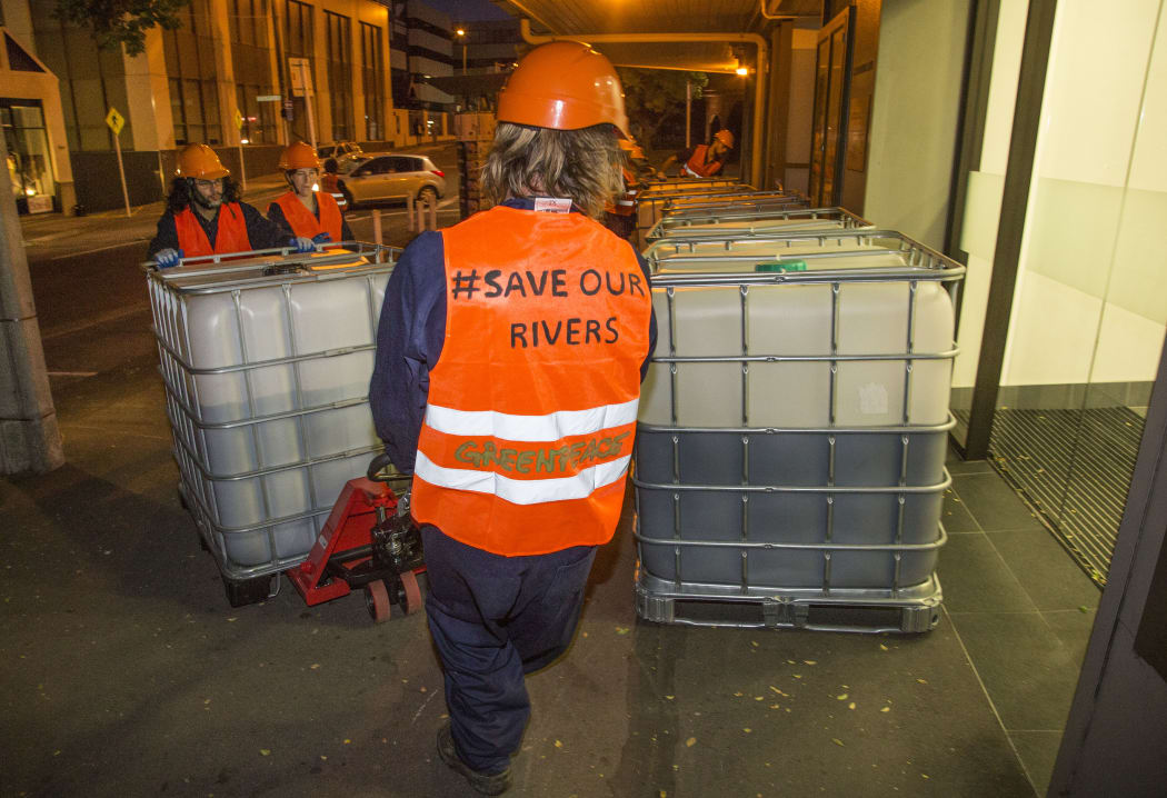 Greenpeace has dumped 6000 litres of cow urine and other dairy waste at the ACC's old Wellington head office.