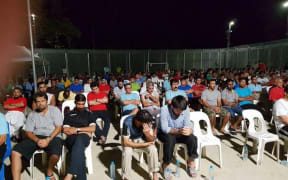 Hundreds gather for memorial service for Pakistani refugee who drowned.