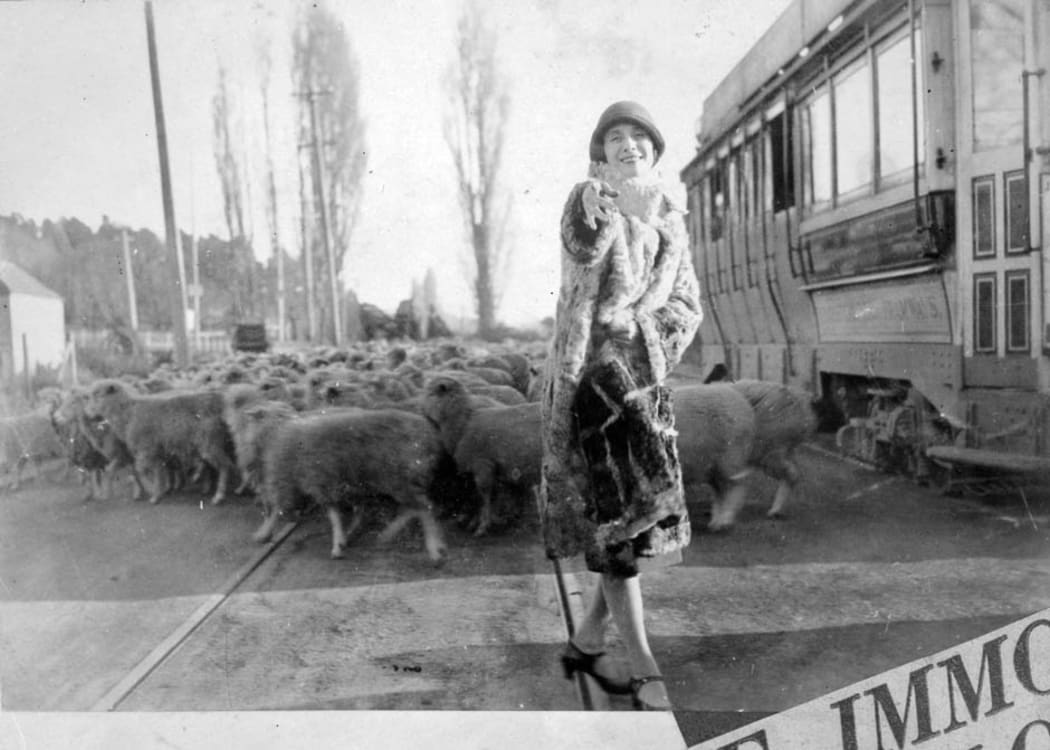 The legendary Russian ballerina Anna Pavlova poses with a flock of sheep during her visit to New Zealand in 1926.