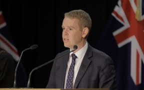 Prime Minister Chris Hipkins speaks to the media