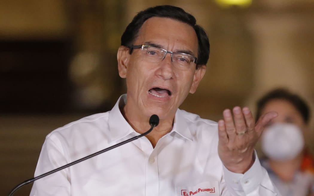 Peruvian President Martin Vizcarra gives a farewell statement to the press before leaving the presidential Palace in Lima, following his impeachment by an overwhelming majority Congress vote on November 9, 2020, during a second political trial against him in less than two months.