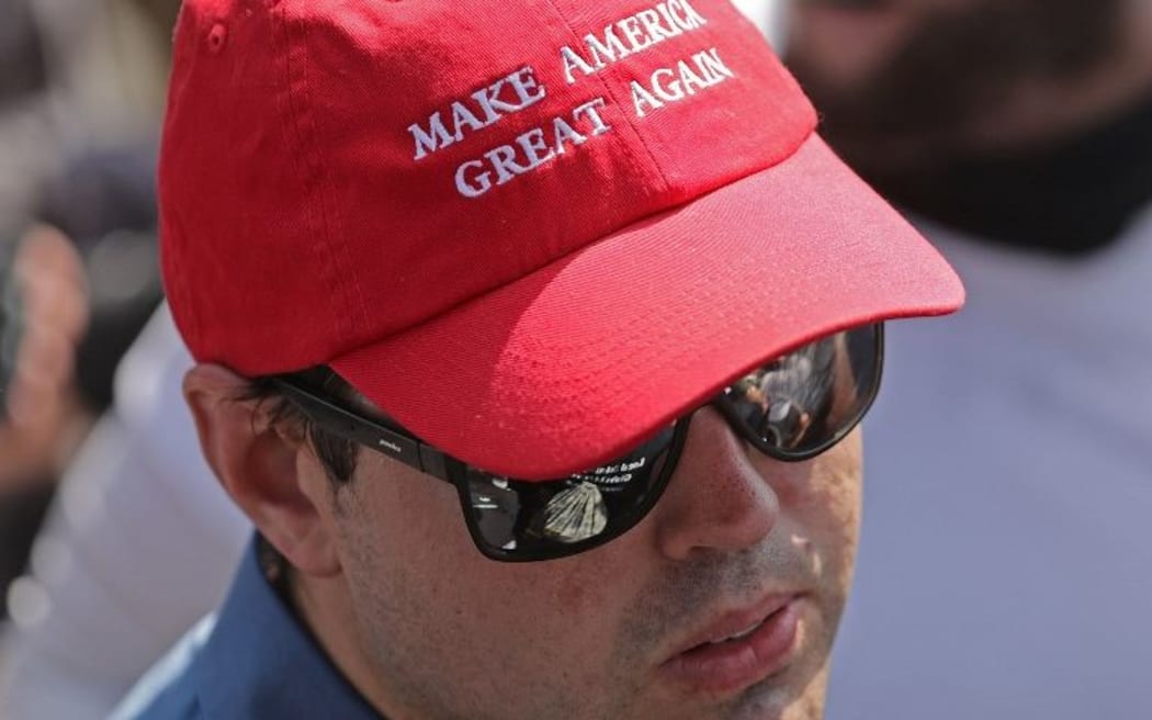A man wears a 'Make America Great Again' hat during the "Unite the Right" rally.
