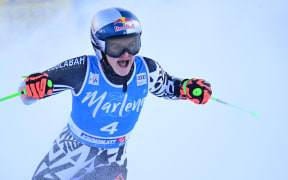 New Zealand's Alice Robinson celebrates winning the women's giant slalom at the World Cup event in Kronplatz, Plan de Corones, Italy.