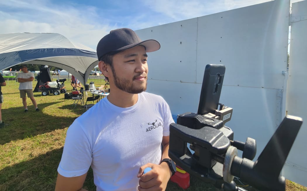 Robert Mi, co-founder of Aerolab, at the controls of the P100 agricultural spray drone