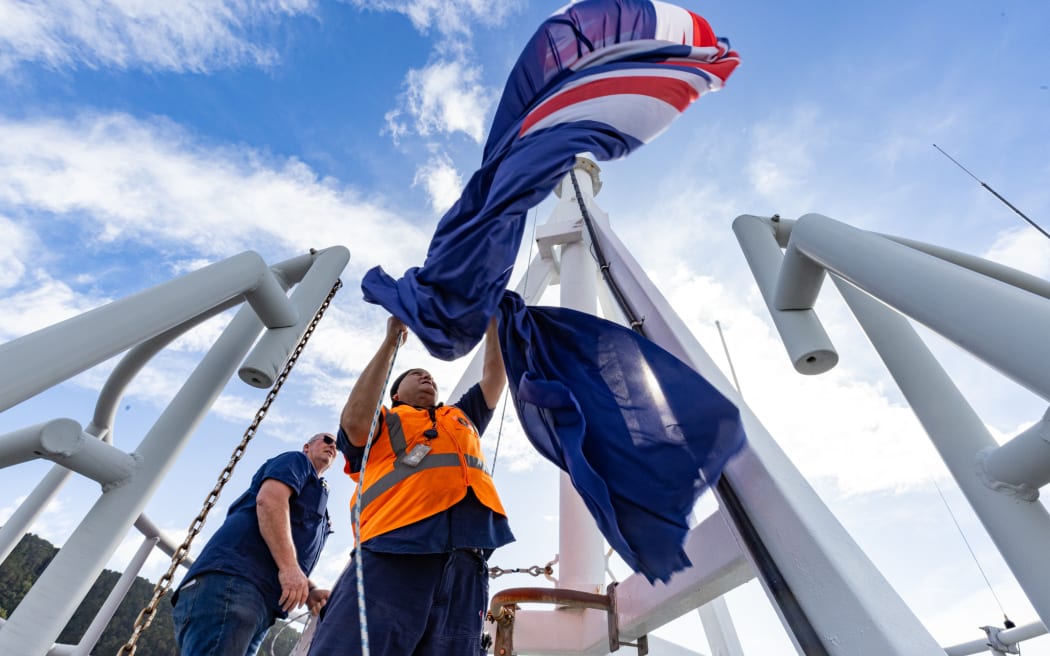 The Beehive flag is lowered in preparation for being hoisted to half mast to mark the death of the Maori King, Tūheitia Pōtatau Te Wherowhero.