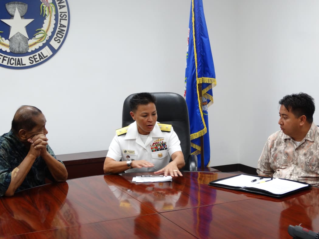 Joint Region Marianas commander Rear Adm. Bette Bolivar with Governor Iloy Enos and deputy Ralph Torres