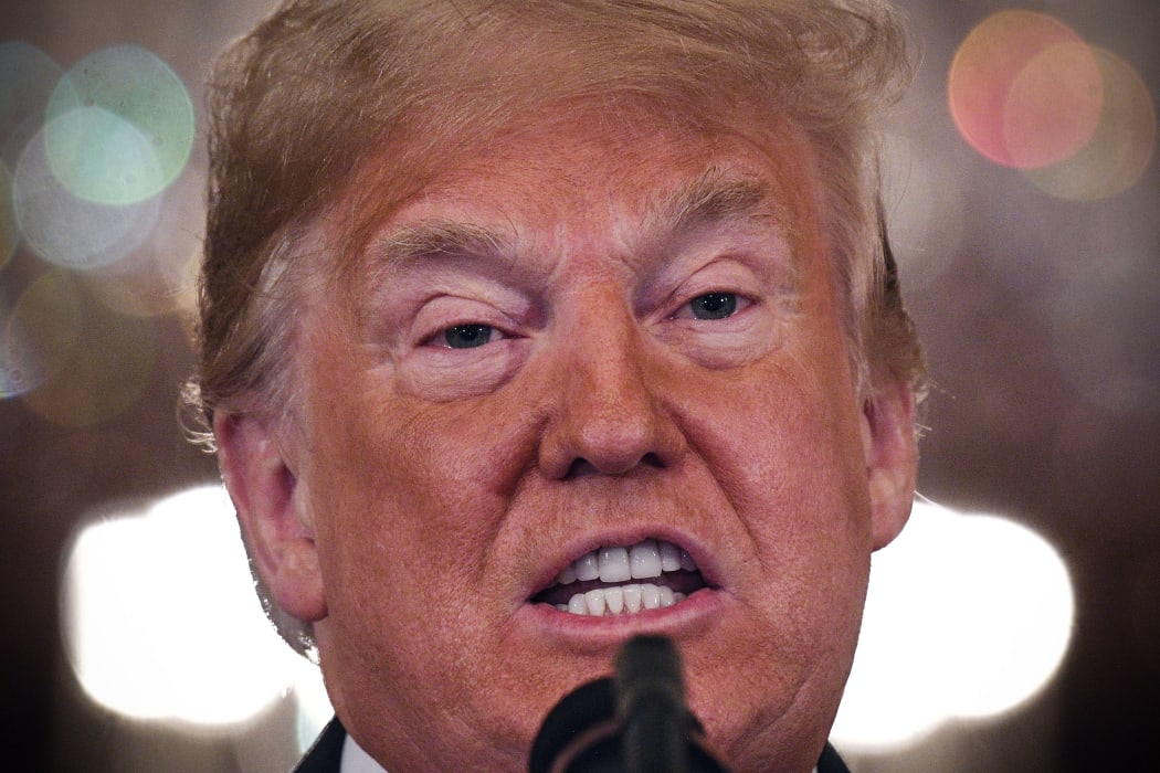 US President Donald Trump speaks during a post-election press conference in the East Room of the White House in Washington, DC on November 7, 2018. (Photo by Jim WATSON / AFP)
