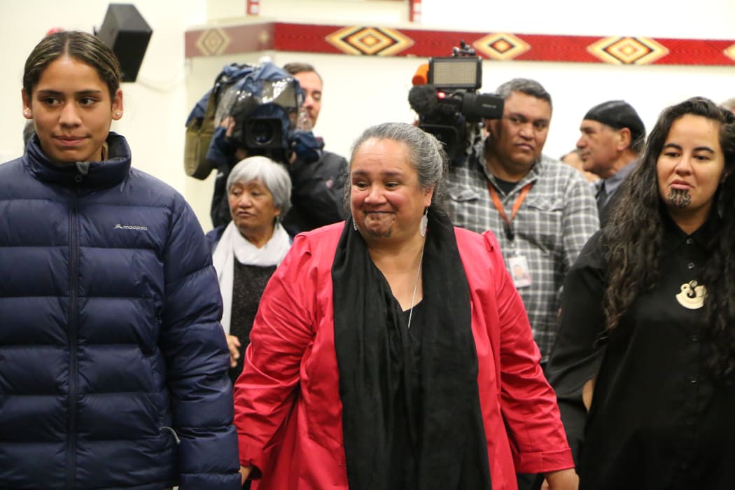 Glenis Philip-Barbara (centre) and Julia Whaipooti from the Office of the Children's Commission (right).