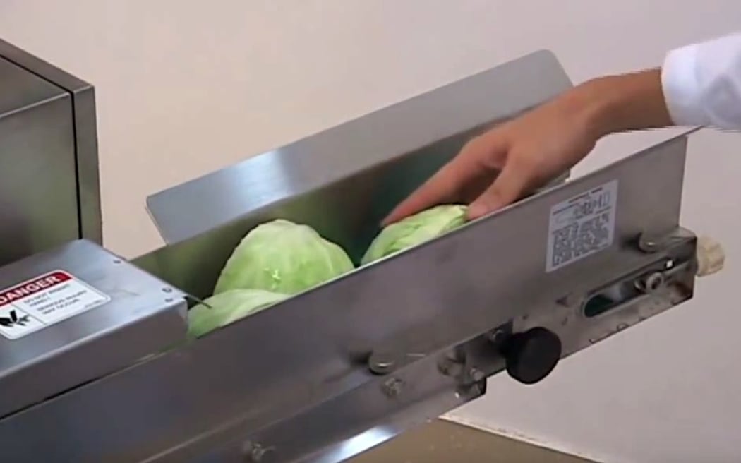 A belt slicer in action