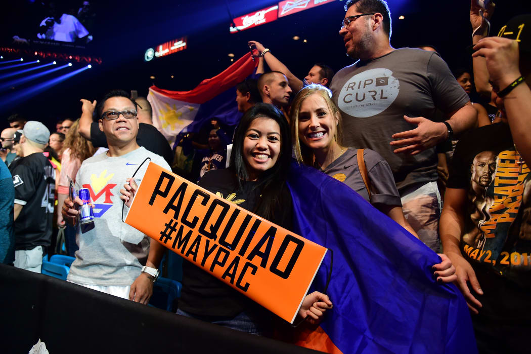 Boxing fans show their support ahead of the weigh-in for the so-called Fight of the Century.