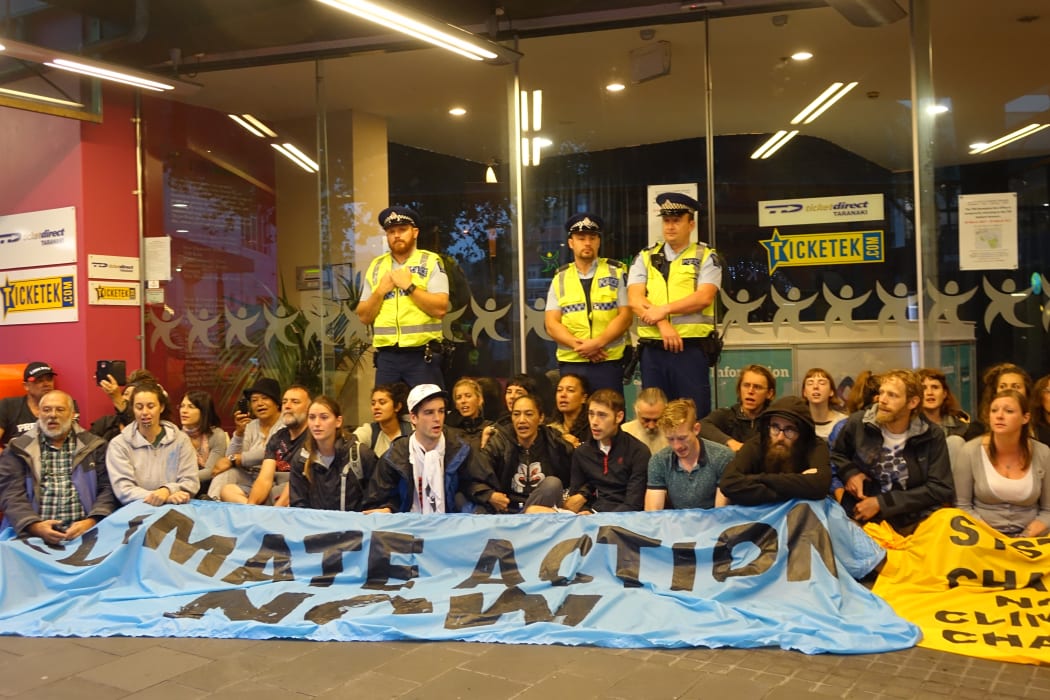 Protesters block the entrance to the TSB Showplace, New Plymouth, where the NZ Petroleum Conference is being held.