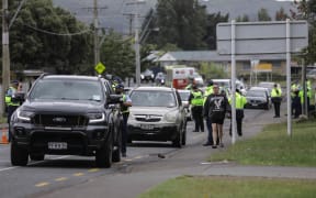 Police set up checkpoints in Wainuiomata ahead of a tangi for slain gang member Albert Enoka on 17 November, 2024.