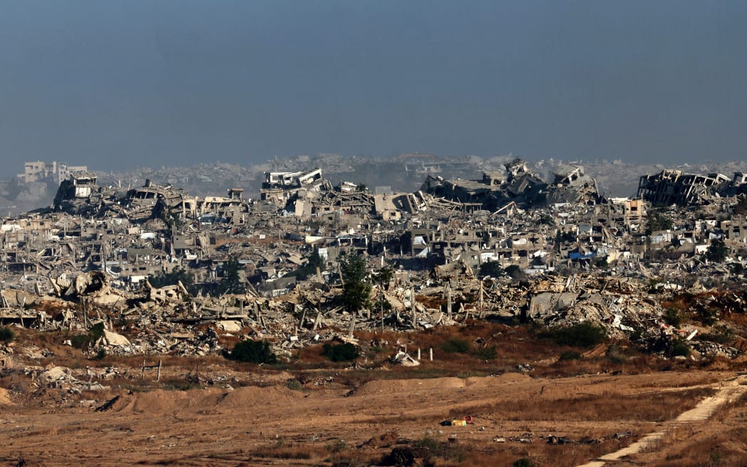 This picture taken from the Israeli side of the border with the Gaza Strip shows destroyed buildings in the northern sector of the besieged Palestinian territory on May 29, 2025, 19 months after the war broke out between Israel and the Hamas militant movement. (Photo by Jack GUEZ / AFP)
