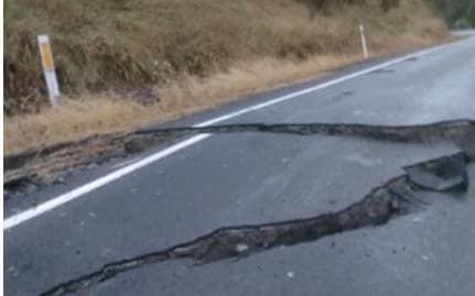 The crack along the Mangahauini Gorge area has been filled in and levelled, but the road remains unsealed.