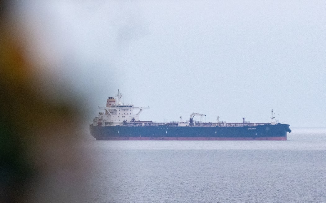 19 April 2025, Mecklenburg-Western Pomerania, Sellin: View of the tanker "Eventin" off the coast of the island of Rügen. The oil tanker "Eventin", which was confiscated by German customs, has been relocated. The ship is still close to the Baltic Sea island of Rügen, around three nautical miles away from its previous mooring position, as the German Press Agency has learned from official sources. It is an anchorage where ships with dangerous goods can safely moor without affecting the surrounding area. Tugs commissioned by the customs authorities towed the ship to the Nordperd roadstead. The tanker is one of more than 150 ships in the so-called Russian shadow fleet, which is subject to EU sanctions. The "Eventin" drifted in the Baltic Sea for hours in January, unable to maneuver - all systems had failed. According to earlier information, the Panama-flagged ship had around 100,000 tons of oil on board. The tanker was en route from Ust-Luga in Russia to Port Said in Egypt. In April, the Federal Ministry of...