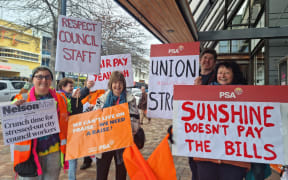 Nelson City Council PSA delegate Jenny Sims second from left and PSA organiser Ian Hoffman second from right