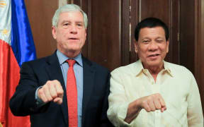 Australian Secret Intelligence Service director-general Nick Warner photographed with Philippines President Rodrigo Duterte.