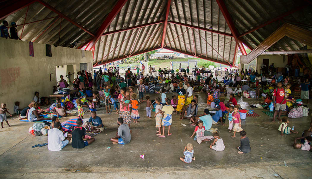 People sheltering at an evacuation centre in Honiara.