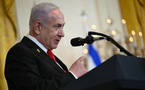 Israel's Prime Minister Benjamin Netanyahu speaks during a press conference with US President Donald Trump in the East Room of the White House in Washington, DC, on February 4, 2025.