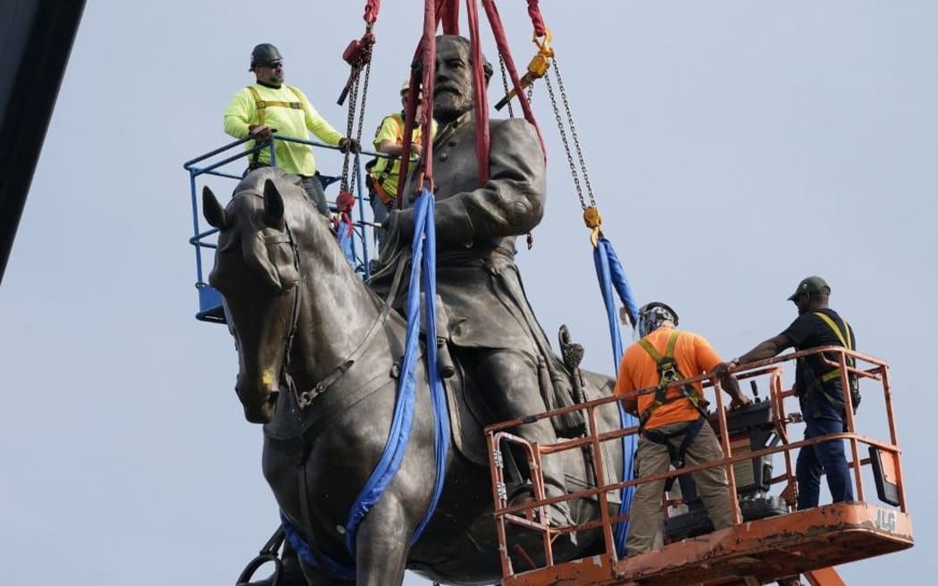 RICHMOND, VIRGINIA - SEPTEMBER 08: Crews prepare to remove one of the country's largest remaining monuments to the Confederacy, a towering statue of Confederate General Robert E. Lee on Monument Avenue, September 8, 2021 in Richmond, Virginia.